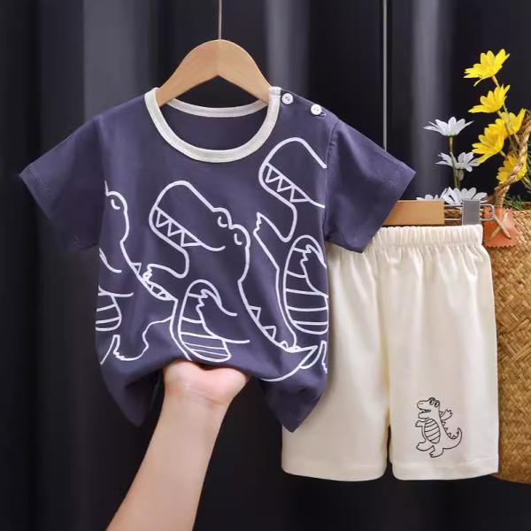 A set of short-sleeved T-shirt and matching shorts, featuring a range of attractive designs that reflect the spirit of childhood and add a touch of joy to your little one's look.