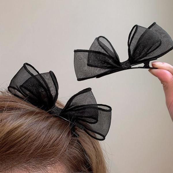 meticulously designed black mesh hairpin features a delicate, sheer design that gives you a feminine look that balances simplicity and elegance.