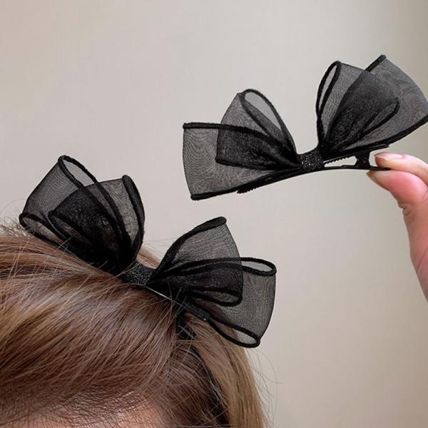 meticulously designed black mesh hairpin features a delicate, sheer design that gives you a feminine look that balances simplicity and elegance.