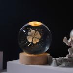 Glass globes with illuminated base. Multiple designs to suit different tastes.