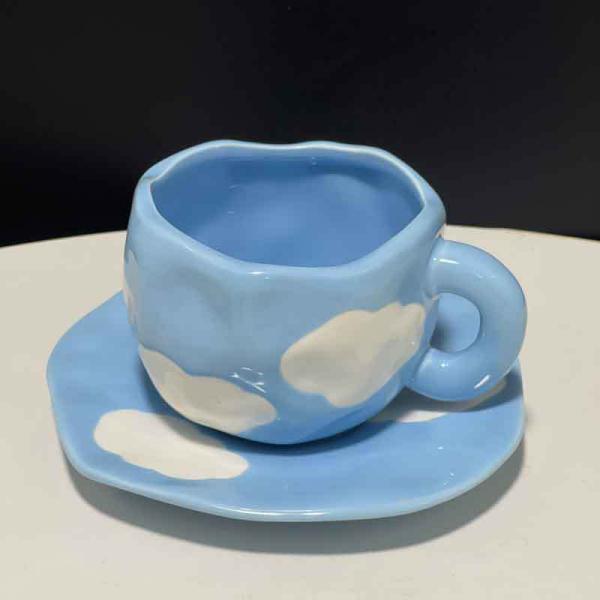 Ceramic coffee cup and coaster, artistic ceramic set, an aesthetic touch that speaks elegance with a hand-drawn cloud drawing