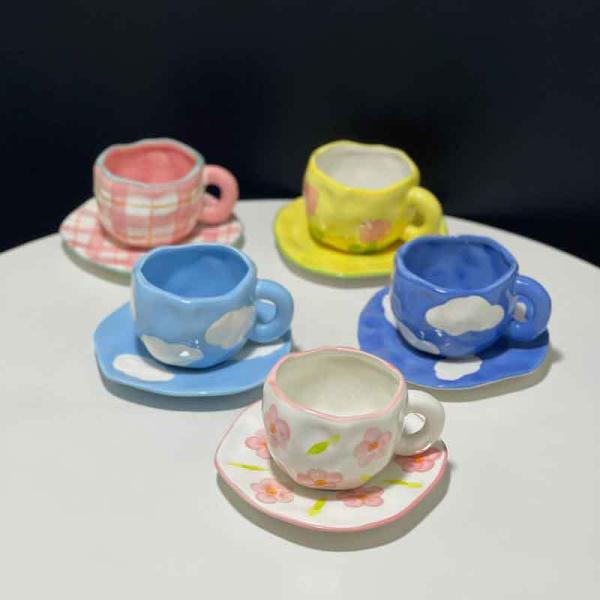 Ceramic coffee cup and coaster, artistic ceramic set, an aesthetic touch that speaks elegance with a hand-drawn cloud drawing