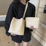 Bucket bags with a wallet are designed in a modern style that combines practicality and elegance. The bags feature a top drawstring design for easy closure.