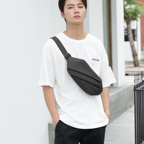 This crossbody bag features an innovative design and a stylish look. Made of durable material in a dark black color