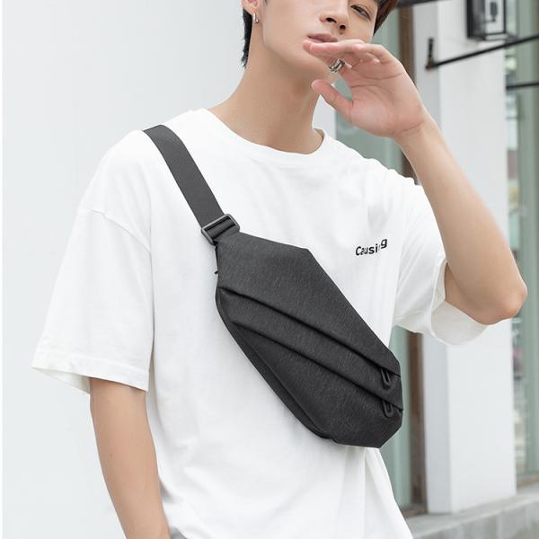 This crossbody bag features an innovative design and a stylish look. Made of durable material in a dark black color