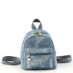 Small backpack and matching handbag in washed blue denim for a modern yet comfortable look.