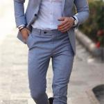 modern gray suit that combines formal and casual elegance. A blend of fabric and polyester materials.