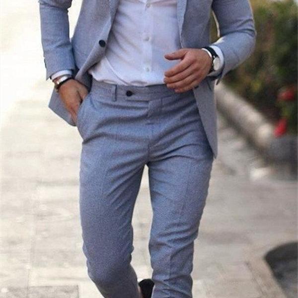 modern gray suit that combines formal and casual elegance. A blend of fabric and polyester materials.