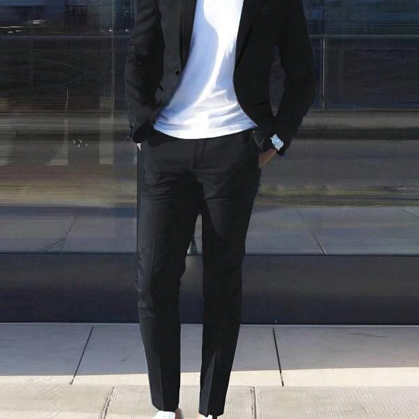 modern gray suit that combines formal and casual elegance. A blend of fabric and polyester materials.