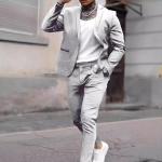 modern gray suit that combines formal and casual elegance. A blend of fabric and polyester materials.