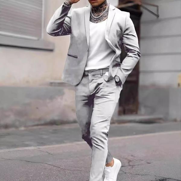 modern gray suit that combines formal and casual elegance. A blend of fabric and polyester materials.