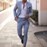 modern gray suit that combines formal and casual elegance. A blend of fabric and polyester materials.
