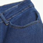 Dark navy skinny jeans highlight your figure and give you a modern look.