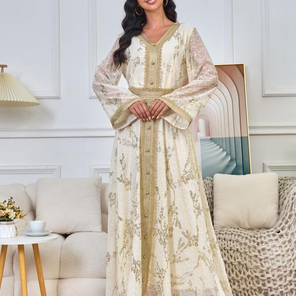 A long, loose, high-tech Moroccan caftan that drapes smoothly over the body, with a V-neckline that accentuates the look.