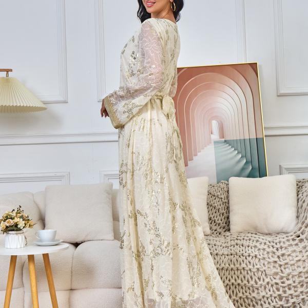 A long, loose, high-tech Moroccan caftan that drapes smoothly over the body, with a V-neckline that accentuates the look.