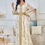 A long, loose, high-tech Moroccan caftan that drapes smoothly over the body, with a V-neckline that accentuates the look.
