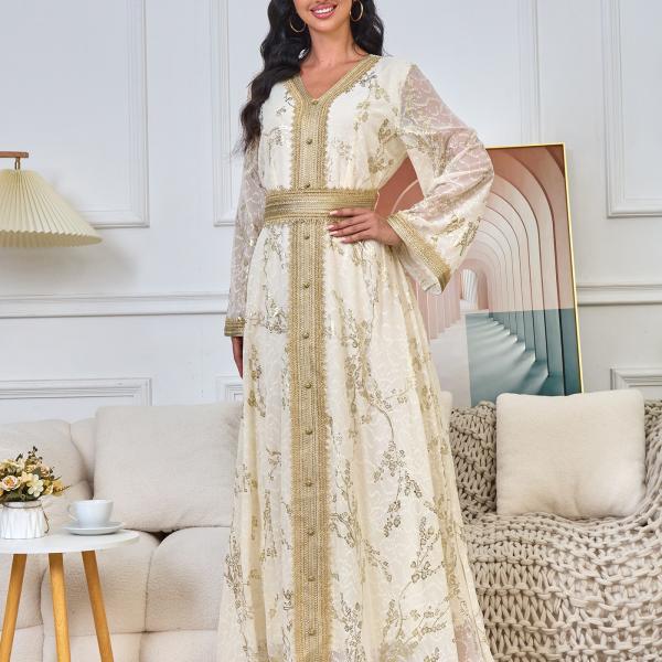A long, loose, high-tech Moroccan caftan that drapes smoothly over the body, with a V-neckline that accentuates the look.