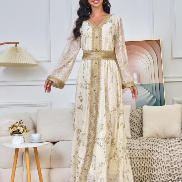 A long, loose, high-tech Moroccan caftan that drapes smoothly over the body, with a V-neckline that accentuates the look.