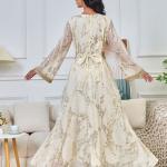 A long, loose, high-tech Moroccan caftan that drapes smoothly over the body, with a V-neckline that accentuates the look.