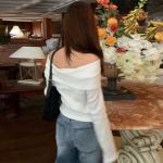 Off-the-shoulder blouse, soft elegance for every season