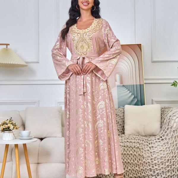 The dream dress, a royal pink caftan with beautiful and luxurious embroidery. Shine like a princess with this luxurious look to create an unforgettable presence.