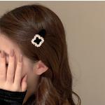 Velvet hair clip embellished with diamond crystals. Elegance that touches the imagination.