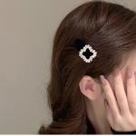 Velvet hair clip embellished with diamond crystals. Elegance that touches the imagination.