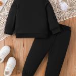 Give your child a look that combines comfort and elegance with this modern black set, specially designed to reflect the playful spirit of childhood.