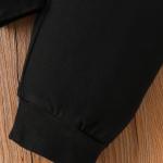 Give your child a look that combines comfort and elegance with this modern black set, specially designed to reflect the playful spirit of childhood.