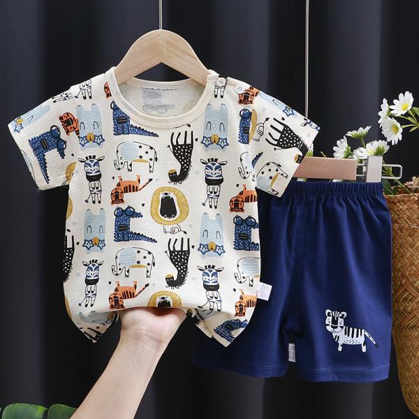 A set of short-sleeved T-shirt and matching shorts, featuring a range of attractive designs that reflect the spirit of childhood and add a touch of joy to your little one's look.