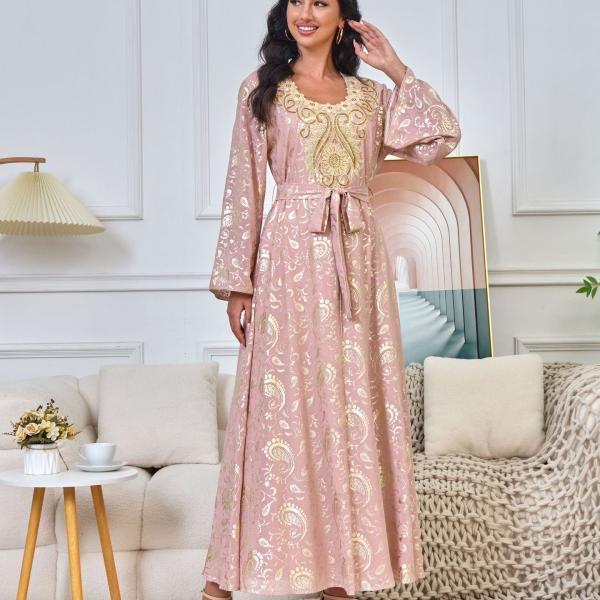 The dream dress, a royal pink caftan with beautiful and luxurious embroidery. Shine like a princess with this luxurious look to create an unforgettable presence.