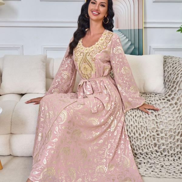 The dream dress, a royal pink caftan with beautiful and luxurious embroidery. Shine like a princess with this luxurious look to create an unforgettable presence.