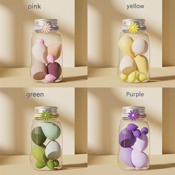 Luxury makeup sponge set in flower-decorated glass containers