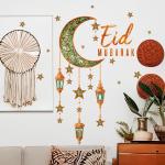 Crescent and lanterns wall decoration with the phrase Eid Mubarak