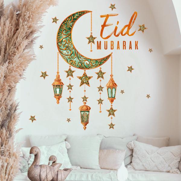 Crescent and lanterns wall decoration with the phrase Eid Mubarak
