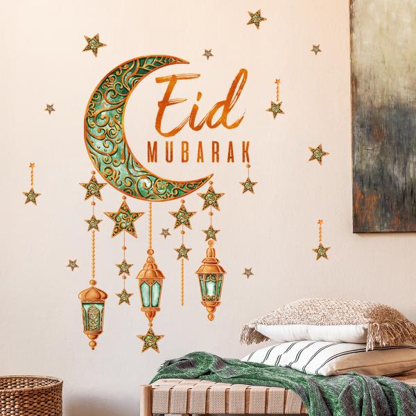 Crescent and lanterns wall decoration with the phrase Eid Mubarak