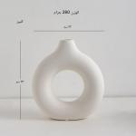 A round plastic vase is an artistic touch that suits your space. Add a touch of elegance and tranquility to your decor with this unique plastic vase.